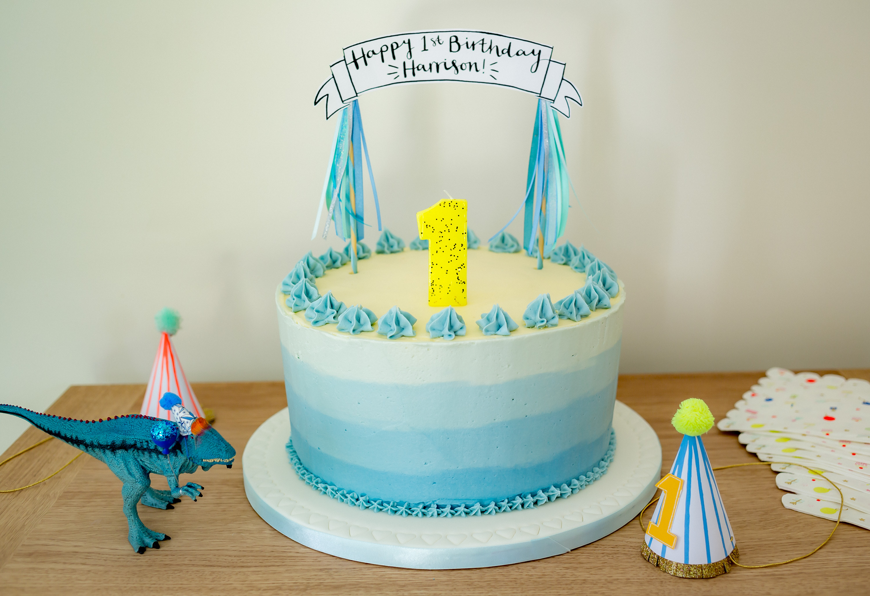 Blue-ombre Victoria sponge for a dinosaur themed 1st birthday